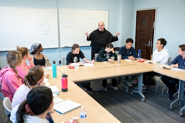 Augustinian speaking to class