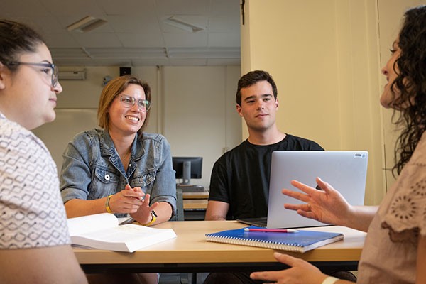Students at table speaking