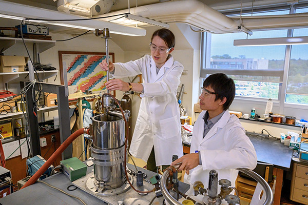 Two students work together in a lab.