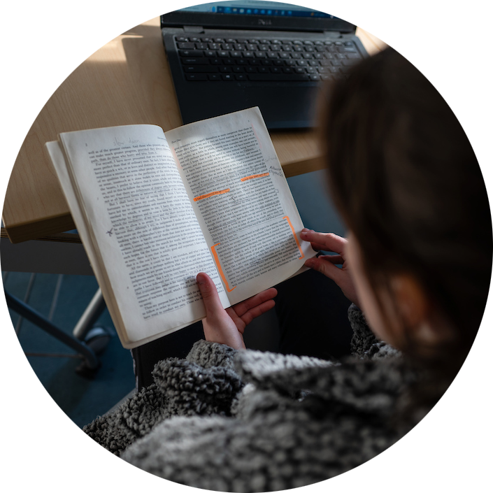 Student reading a book